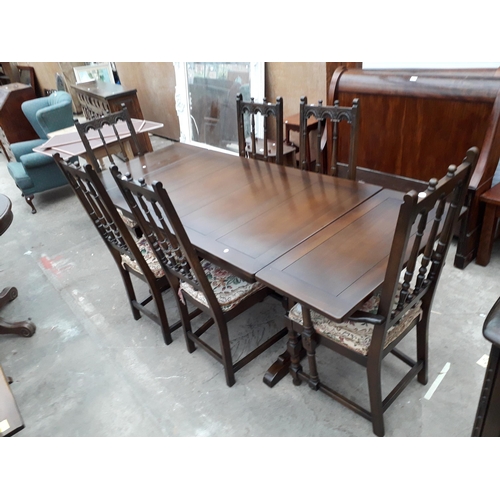 2931 - AN ERCOL COLONIAL STYLE DRAW-LEAF DINING TABLE, 54 X 33