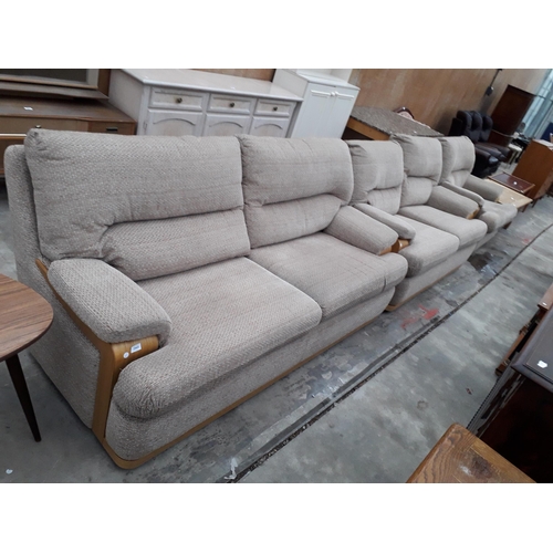 2945 - A RETRO G-PLAN THREE PIECE LOUNGE SUITE COMPRISING TWO SETTEES AND AN EASY CHAIR