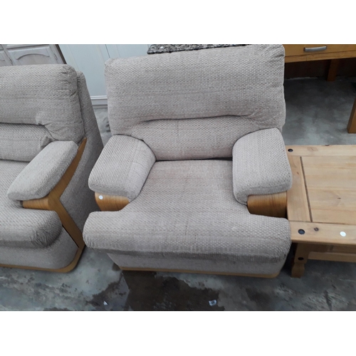 2945 - A RETRO G-PLAN THREE PIECE LOUNGE SUITE COMPRISING TWO SETTEES AND AN EASY CHAIR