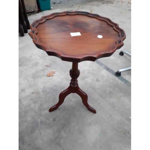 2953 - A REPRODUCTION MAHOGANY WINE TABLE