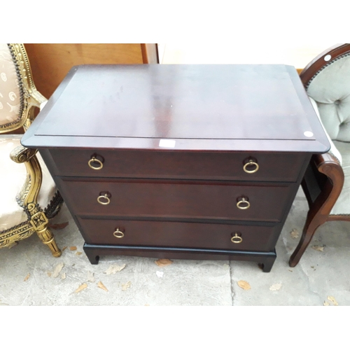 2960 - A STAG MINSTREL CHEST OF THREE GRADUATED DRAWERS, 32