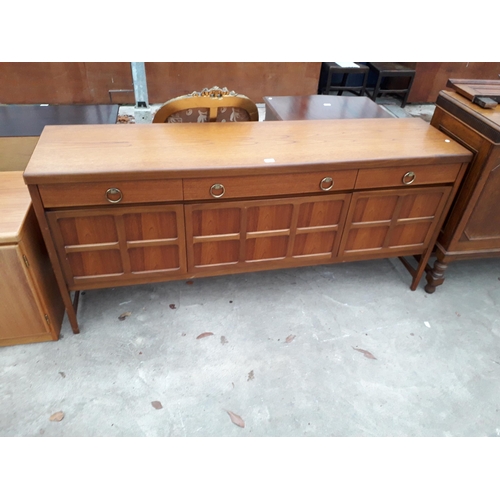 2965 - A NATHAN RETRO TEAK SIDEBOARD ENCLOSING THREE DRAWERS AND THREE CUPBOARDS