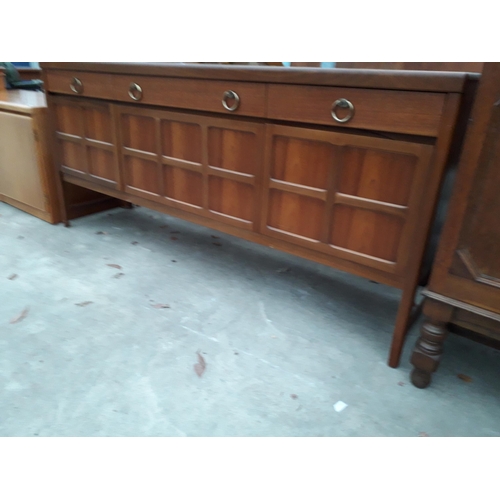 2965 - A NATHAN RETRO TEAK SIDEBOARD ENCLOSING THREE DRAWERS AND THREE CUPBOARDS