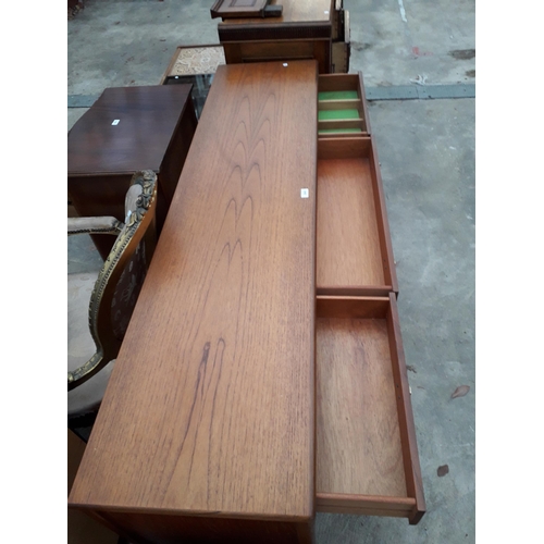 2965 - A NATHAN RETRO TEAK SIDEBOARD ENCLOSING THREE DRAWERS AND THREE CUPBOARDS