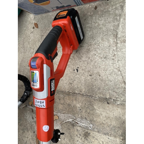 2308H - A BATTERY POWERED GARDEN STRIMMER WITH BATTERY AND CHARGER