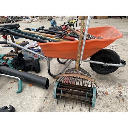 2308I - A WHEELBARROW AND GARDEN TOOLS TO INCLUDE STAINLESS STEEL GARDEN FORKS, ETC