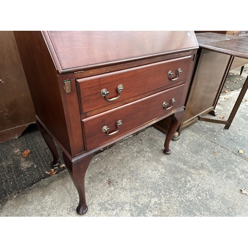 2973 - A MAHOGANY BUREAU ON CABRIOLE SUPPORTS WITH FALL FRONT AND TWO DRAWERS