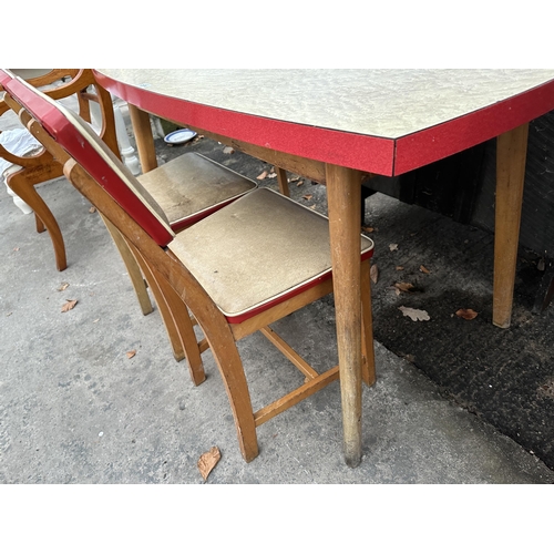 2974 - A RETRO 1960s FORMICA TOPPED KITCHEN TABLE AND TWO MATCHING CHAIRS