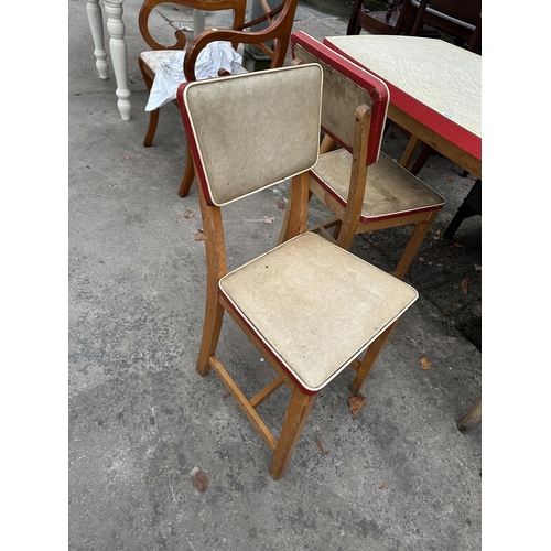 2974 - A RETRO 1960s FORMICA TOPPED KITCHEN TABLE AND TWO MATCHING CHAIRS