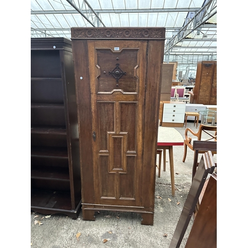 2977 - A GOTHIC STYLE OAK HALL WARDROBE