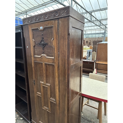 2977 - A GOTHIC STYLE OAK HALL WARDROBE