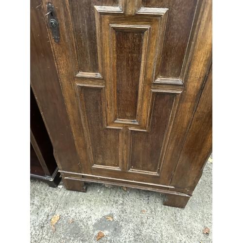 2977 - A GOTHIC STYLE OAK HALL WARDROBE