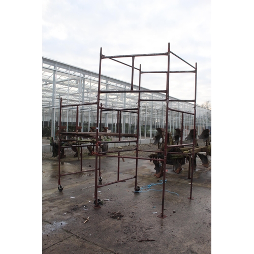 249 - SECTIONAL SCAFFOLDING TOWER WITH INTERLOCKING STEEL TUBE FRAME AND WOODEN WORK PLATFORMS, 
8 RECTANG... 