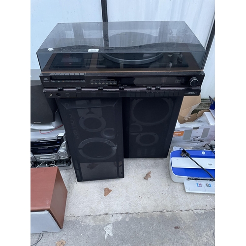 2408 - AN HITACHI STEREO MUSIC CENTRE AND A PAIR OF LARGE YAMAHA SPEAKERS