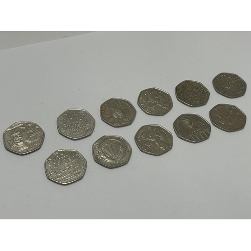 370 - ELEVEN VARIOUS COLLECTABLE FIFTY PENCE PIECES TO INCLUDE, PETER RABBIT, ETC