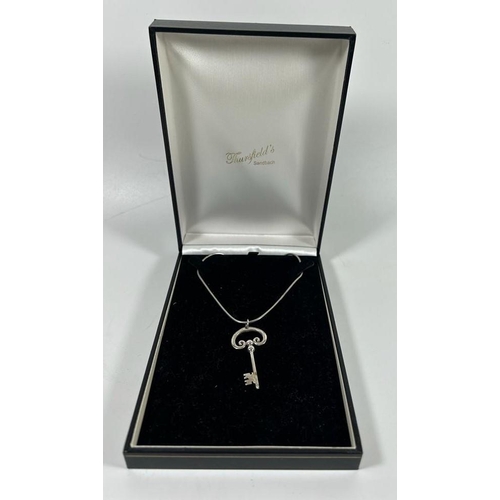 552 - A BOXED .925 SILVER NECKLACE WITH KEY DESIGN PENDANT