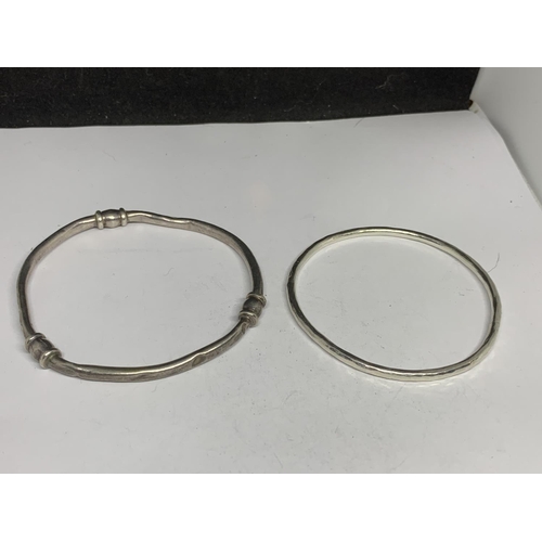 107 - THREE SILVER BANGLES