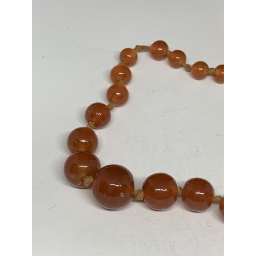 110 - A CARNELIAN NECKLACE