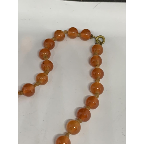 110 - A CARNELIAN NECKLACE