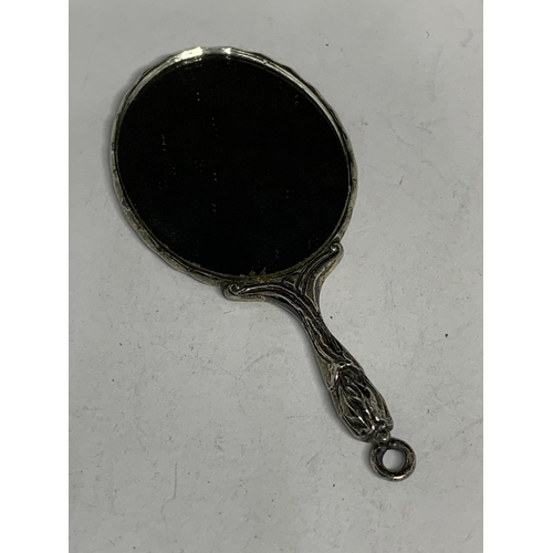 115 - A MINIATURE HAND MIRROR