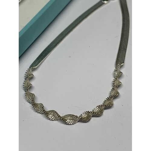 20 - A BOXED SILVER NECKLACE AND BRACELET