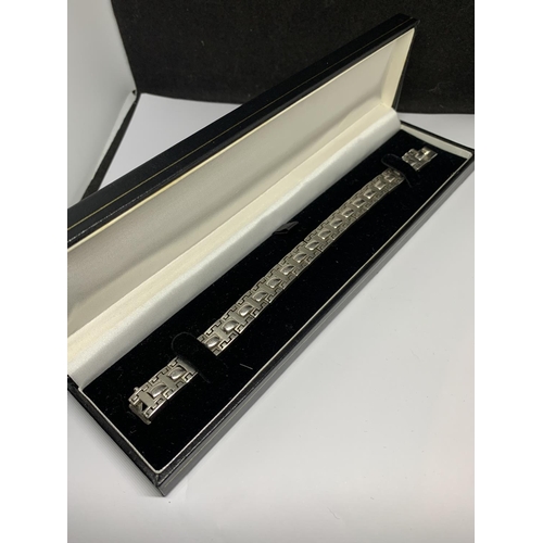 21 - A BOXED SILVER LADIES ORNATE BRACELET