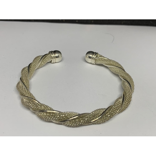 26 - TWO SILVER BANGLES