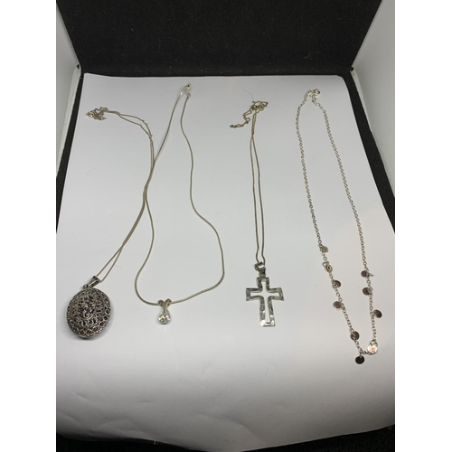 29 - FOUR ASSORTED SILVER NECKLACES