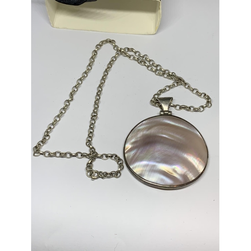 31 - A BOXED SILVER AND MOTHER OF PEARL ROUND NECKLACE