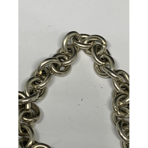 33 - A SILVER FIVE BAR GATE BRACELET