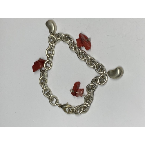 57 - TWO SILVER CHARM BRACELETS