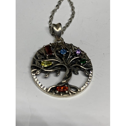 63 - A BOXED SILVER NECKLACE, TREE GEMS