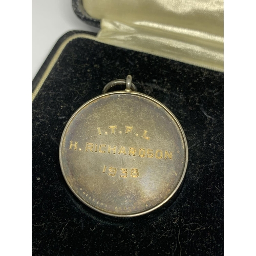 98 - A BOXED SILVER MEDAL