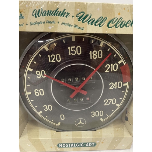 128 - A BOXED MERCEDES WALL CLOCK