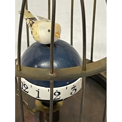 132 - A MECHANICAL BRASS BIRD CAGE CLOCK