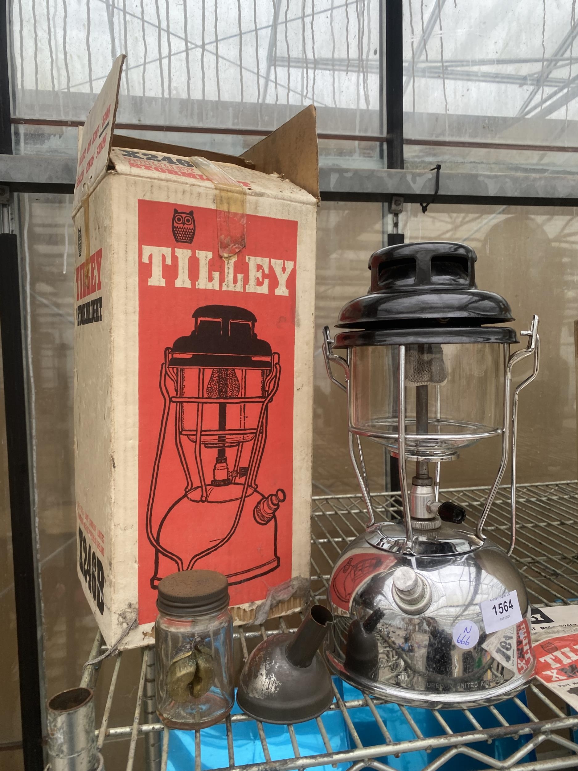 A VINTAGE TILLEY LAMP WITH ORIGINAL BOX, SPARE BURNER AND FILLING FUNNEL