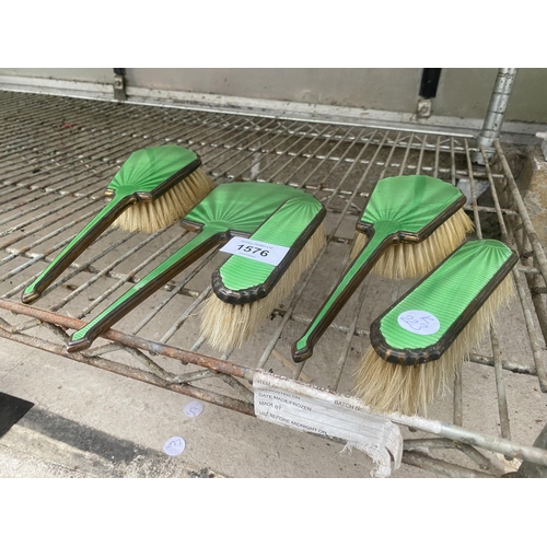 1576 - FIVE VINTAGE GREEN ENAMELED BRASS DRESSING TABLE BRUSHES