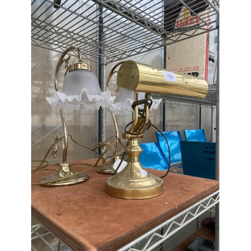 1583 - A PAIR OF VINTAGE BRASS LAMPS WITH GLASS SHADES AND A VINTAGE BRASS BANKERS LAMP