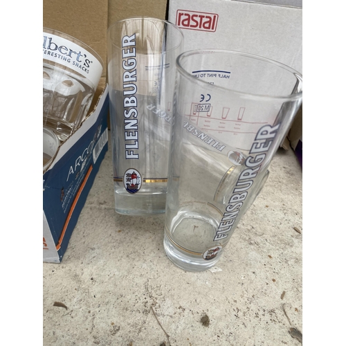 1600 - AN ASSORTMENT OF BRANDED GLASSES TO INCLUDE DORTMUNDER AND FLENSBURGER ETC