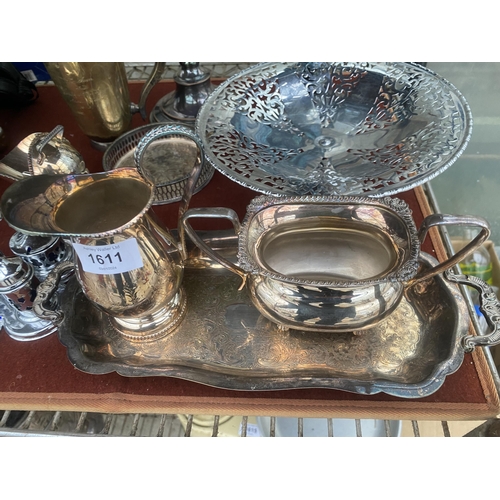 1611 - AN ASSORTMENT OF SILVER PLATED ITEMS TO INCLUDE A PAIR OF CANDLESTICKS, A TWIN HANDLED TRAY AND A CR... 