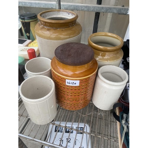 1612A - AN ASSORTMENT OF STONEWARE VESSELS TO INCLUDE TWO BROWN AND CREAM GLAZED POTS AND A HORNSEA FLOUR CA... 