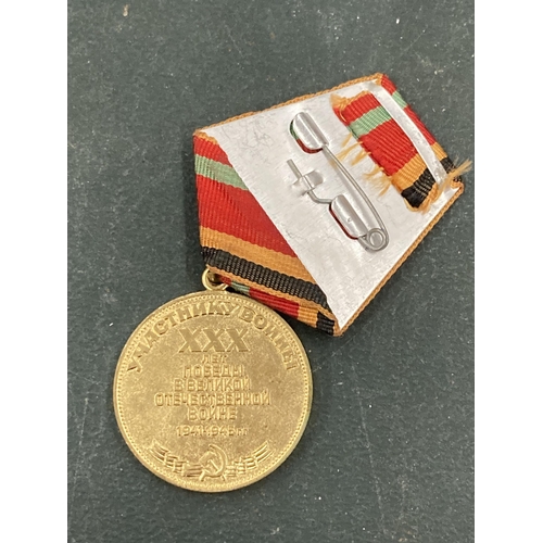 130 - AN ORIGINAL SOVIET RED ARMY, 30 YEARS OF VICTORY, MOUNTED WAR MEDAL