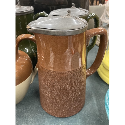 134 - FOUR VICTORIAN PEWTER LIDDED JUGS IN GOOD CONDITION