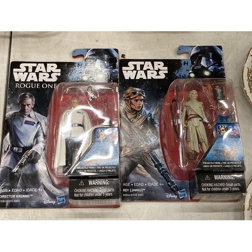 184 - TWO STAR WARS FIGURES, REY AND DIRECTOR KRENNIC, MINT ON CARDS