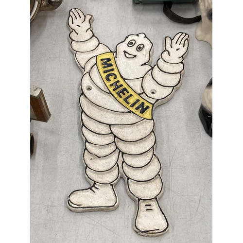 207 - A CAST MICHELIN MAN SIGN, HEIGHT 32CM