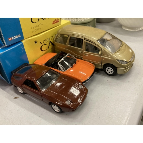 211 - THREE BOXED CORGI 'A CENTURY OF CARS' TO INCLUDE A PORSCHE 928 GT, 914 AND A NISSAN PRAIRIE