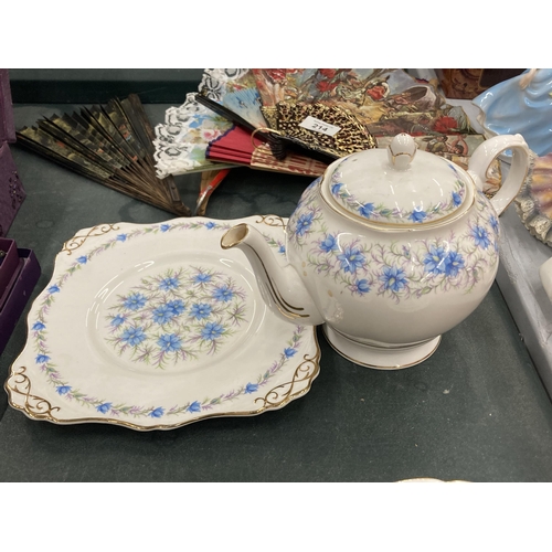 213 - A ROYAL ALBERT TUSCAN 'LOVE IN THE MIST' TEAPOT, CAKE PLATE AND TWO TRIOS, GOOD CONDITION