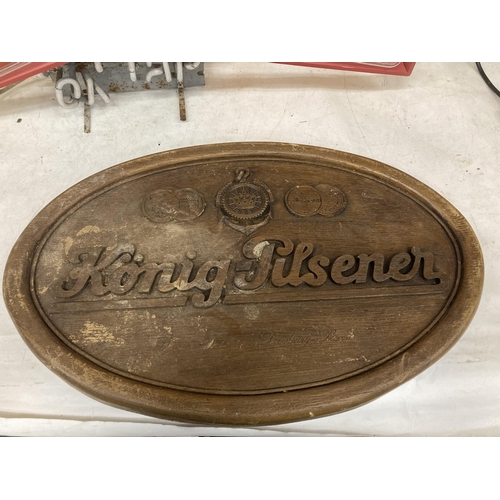 219 - A KONIG PILSENER WOODEN WALL PLAQUE, DIAMETER 61CM