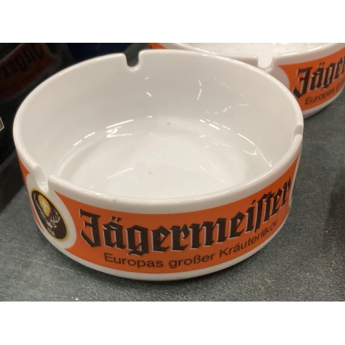 250 - TWO JAGERMEISTER CERAMIC ASHTRAYS