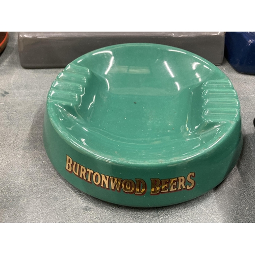 254 - THREE CERAMIC ASHTRAYS TO INCLUDE YOUNGERS, BURTONWOOD AND ANSELLS